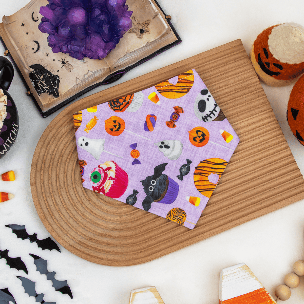 halloween dog bandana featuring cute halloween desserts such as cupcakes, donuts